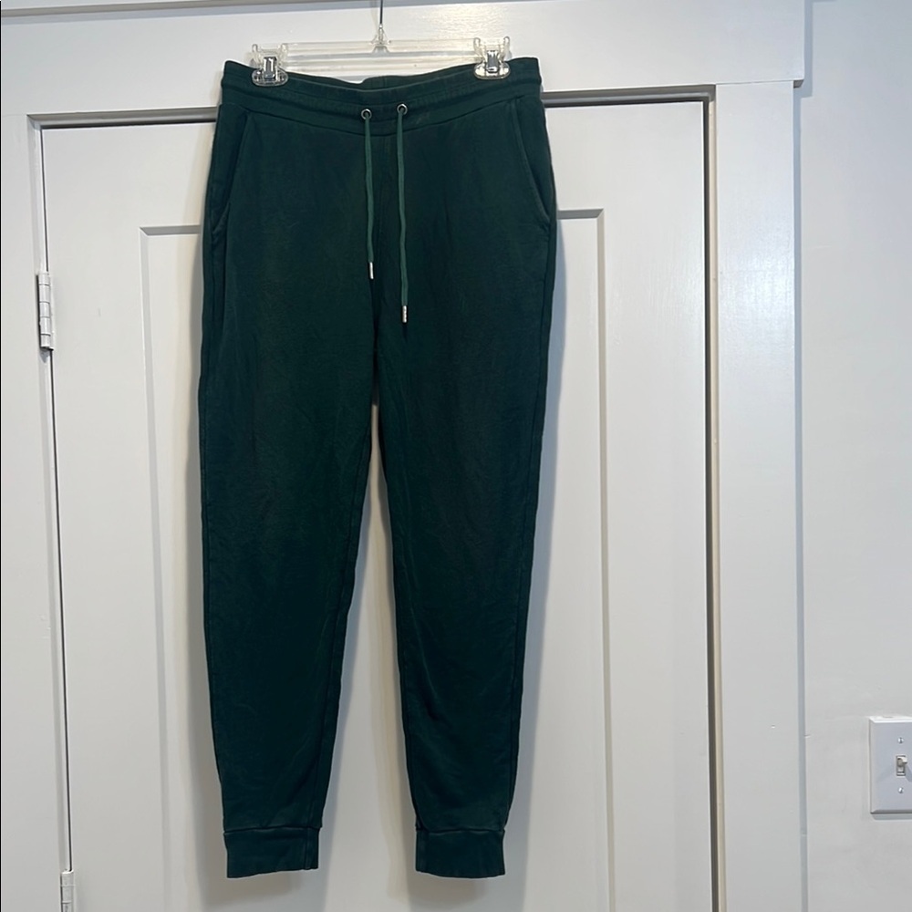 ASOS Green Sweatpants with Elastic Waistband and Tapered Fit size medium.